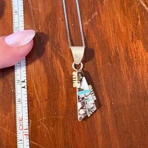 Elegant Silver and Turquoise Pendant Necklace
